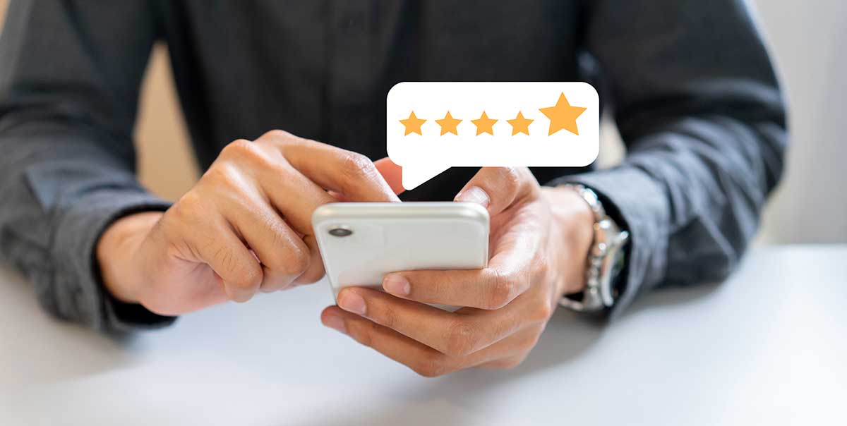 Top 10 Ways to Improve Your Local SEO Right Now image Get reviews from customers such as this man giving five-star rating.